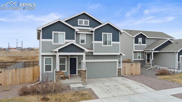 view of front of property with a garage