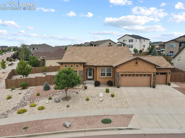 view of front of property featuring a garage