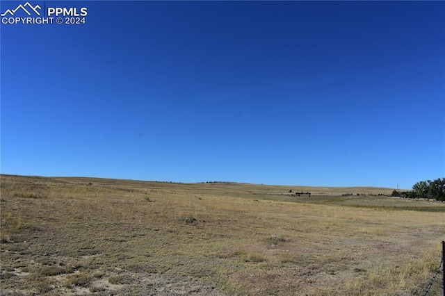 view of landscape with a rural view