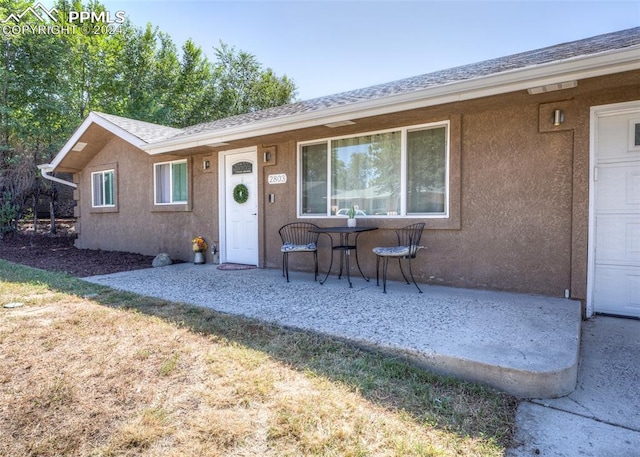 view of front of house featuring a patio