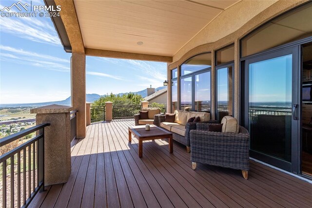 deck featuring an outdoor living space