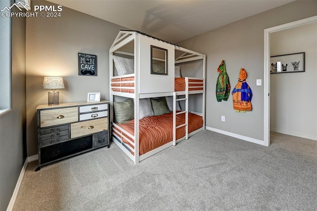 bedroom featuring carpet