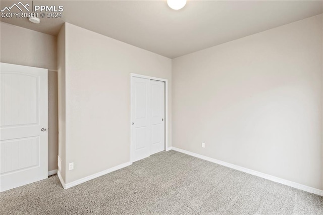 unfurnished bedroom with carpet floors