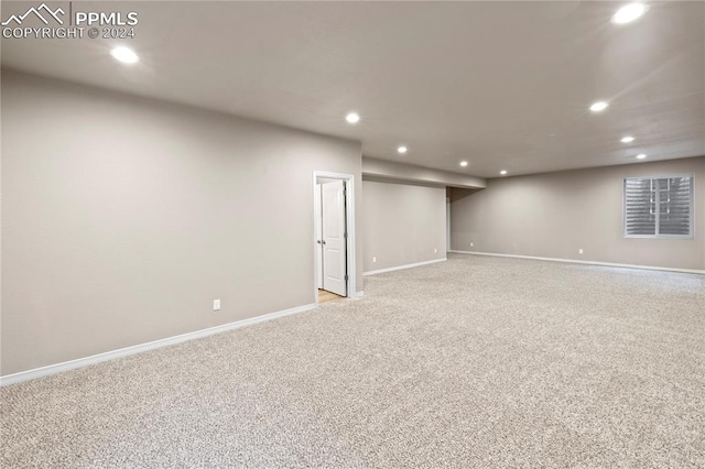 basement with light carpet