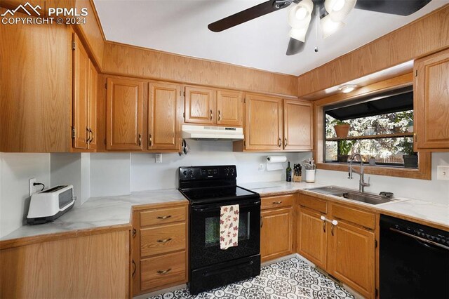 kitchen featuring black appliances, ceiling fan, and sink