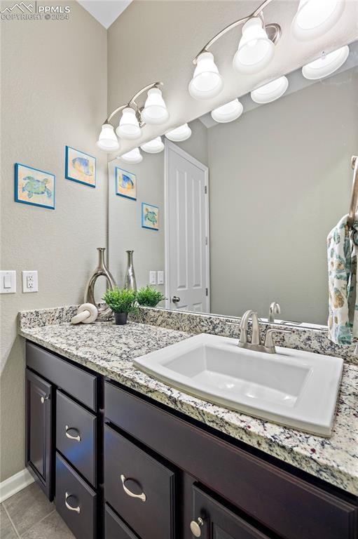 bathroom featuring vanity and tile patterned floors