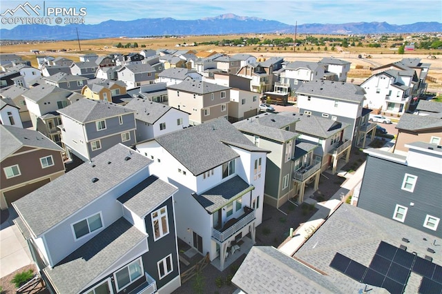 drone / aerial view featuring a mountain view