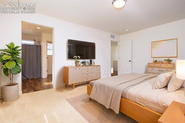 bedroom featuring wood-type flooring