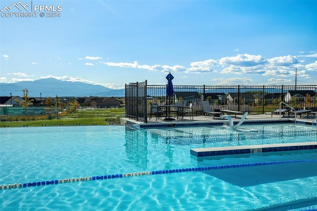 view of pool featuring a mountain view