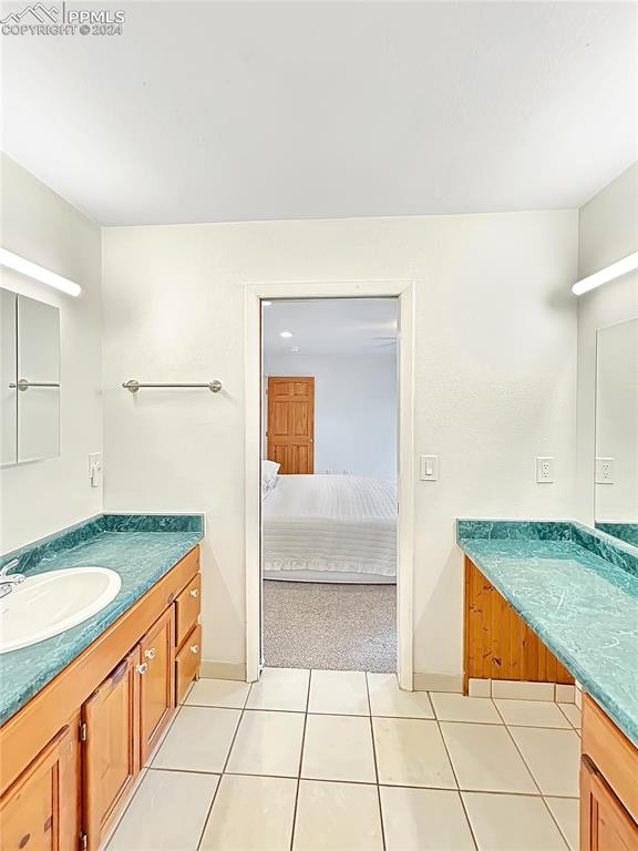 bathroom featuring vanity and tile patterned floors