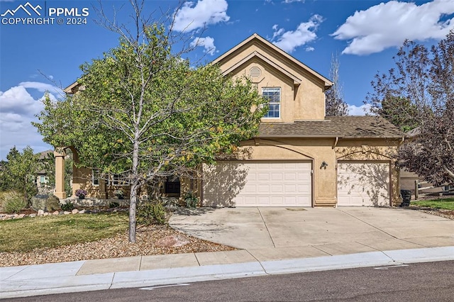 view of front of home featuring a garage