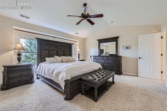 bedroom featuring ceiling fan, lofted ceiling, and light carpet