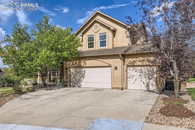 view of front of home featuring a garage