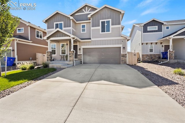 craftsman house with a garage