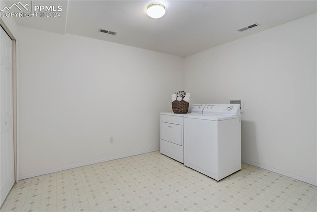 laundry area with washer and clothes dryer