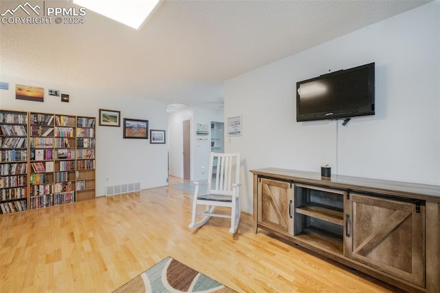 living room with wood-type flooring