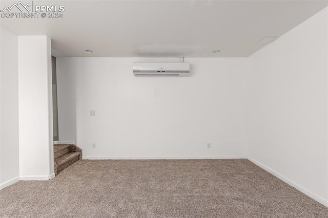 carpeted empty room with an AC wall unit