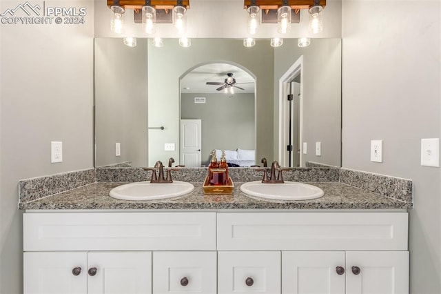 bathroom with vanity and ceiling fan