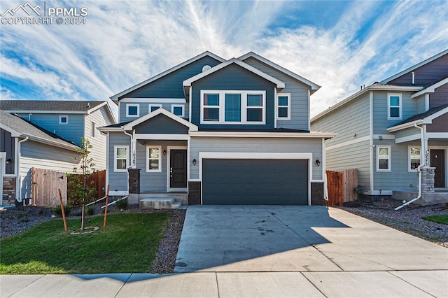 craftsman house featuring a garage