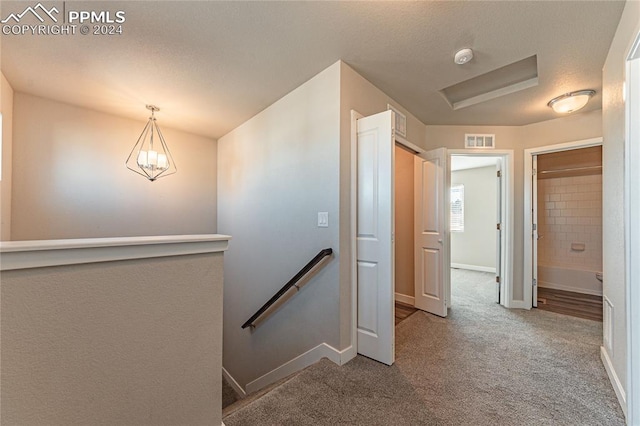 corridor featuring carpet flooring