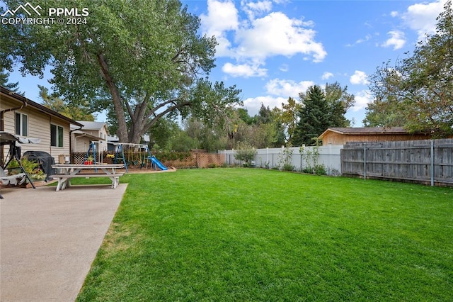 view of yard featuring a playground