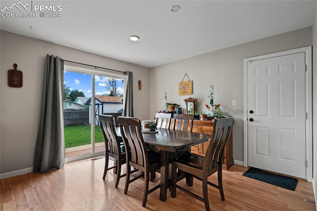 dining space featuring light hardwood / wood-style flooring