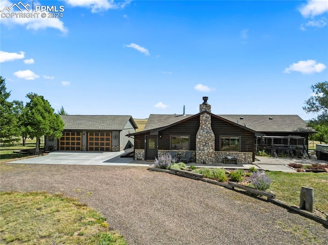 view of front of home with a front lawn and a patio area