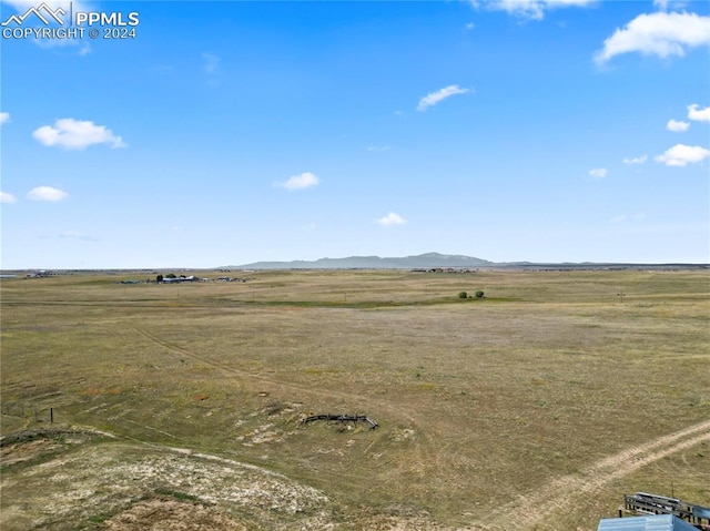 exterior space with a mountain view and a rural view