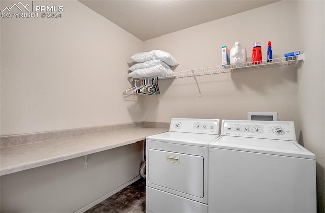 clothes washing area featuring washer and clothes dryer