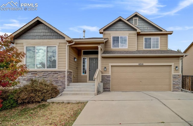 craftsman-style home featuring a garage