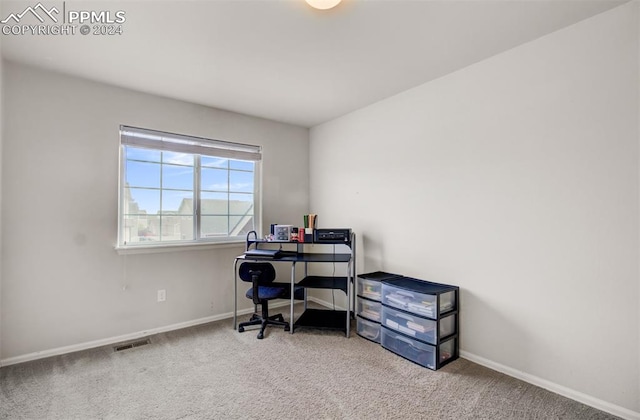 home office featuring carpet flooring