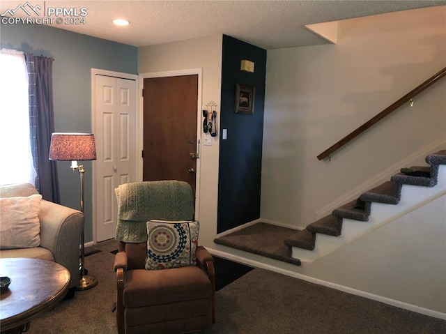 interior space with a textured ceiling