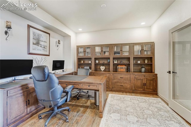 office space featuring hardwood / wood-style flooring