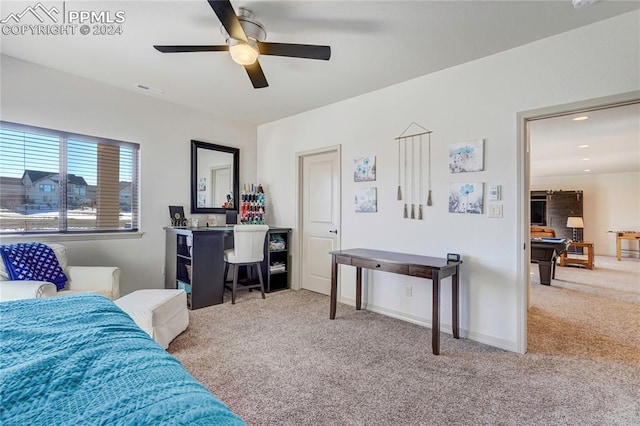 bedroom with light colored carpet and ceiling fan