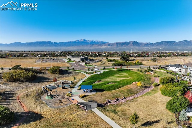 drone / aerial view featuring a mountain view