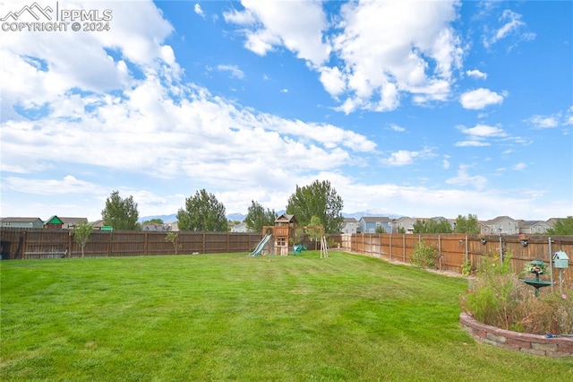 view of yard featuring a playground