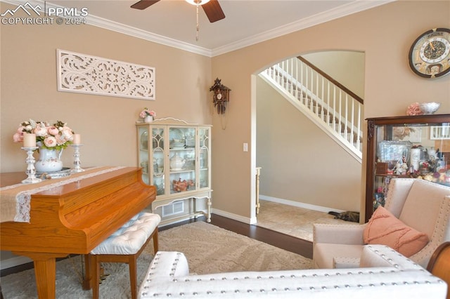 interior space featuring ornamental molding, ceiling fan, and light tile patterned floors