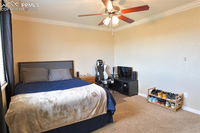 carpeted bedroom with ceiling fan and crown molding