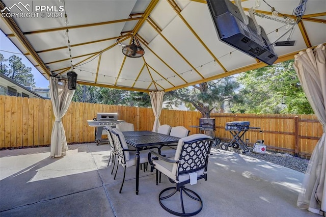 view of patio featuring grilling area and a gazebo