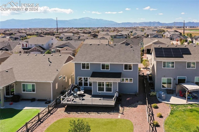 aerial view featuring a mountain view