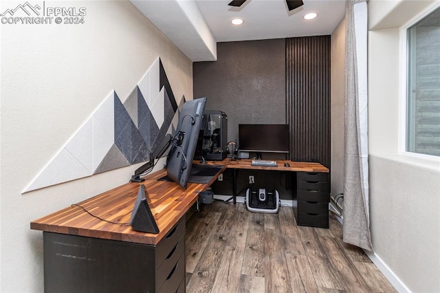 office area featuring wood-type flooring and ceiling fan