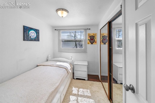 bedroom with light hardwood / wood-style floors