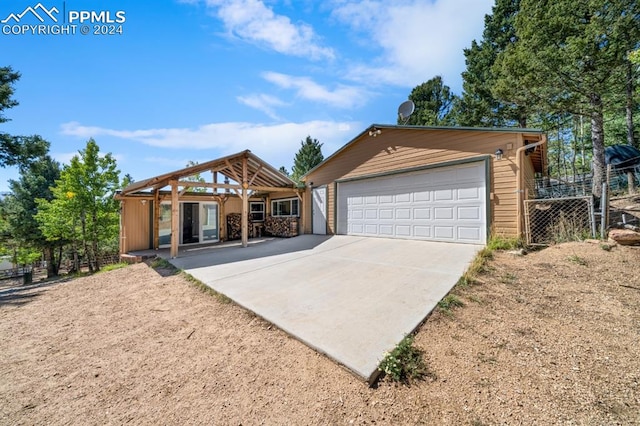 view of front of home with a garage