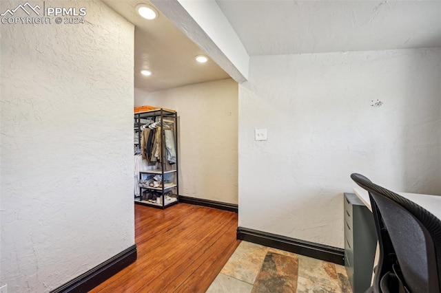 interior space with hardwood / wood-style flooring