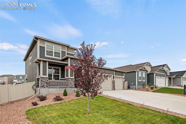 view of front of home with a garage and a front yard