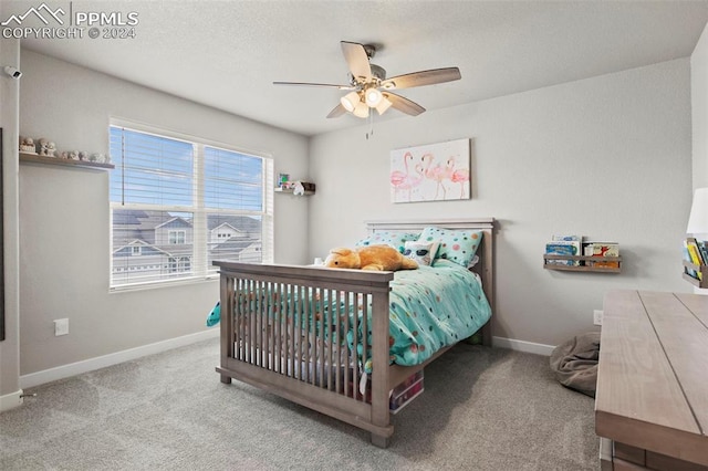 bedroom featuring carpet and ceiling fan