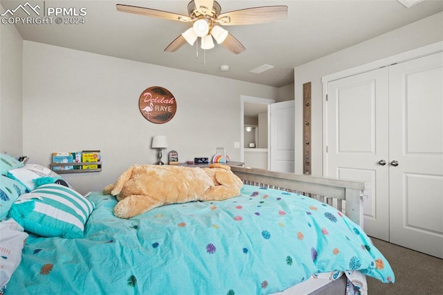 carpeted bedroom with a closet and ceiling fan