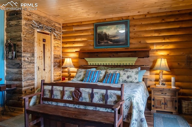 bedroom featuring rustic walls, wooden ceiling, and hardwood / wood-style floors