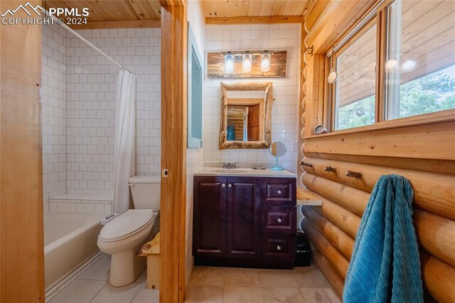 full bathroom featuring wood ceiling, tile walls, shower / tub combo with curtain, vanity, and toilet