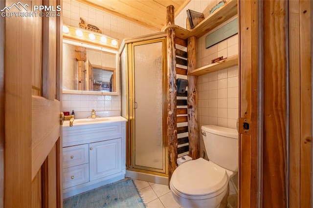 bathroom featuring walk in shower, vanity, toilet, and tile patterned floors